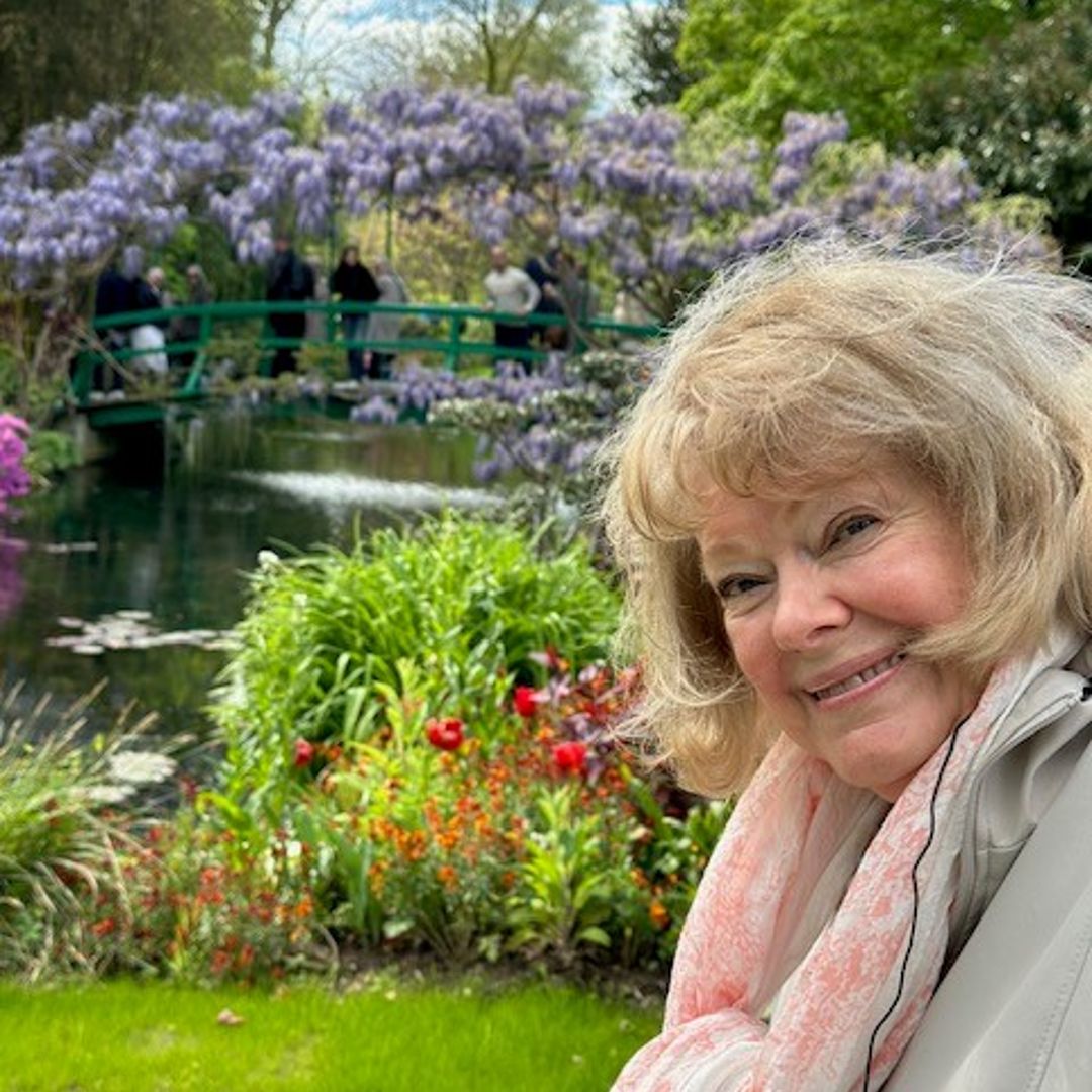 Eve Martin smiling in Royal Roads University's Japanese Gardens