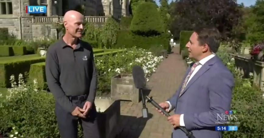 President Philip Steenkamp speaking into a microphone with a CTV News Network camera person