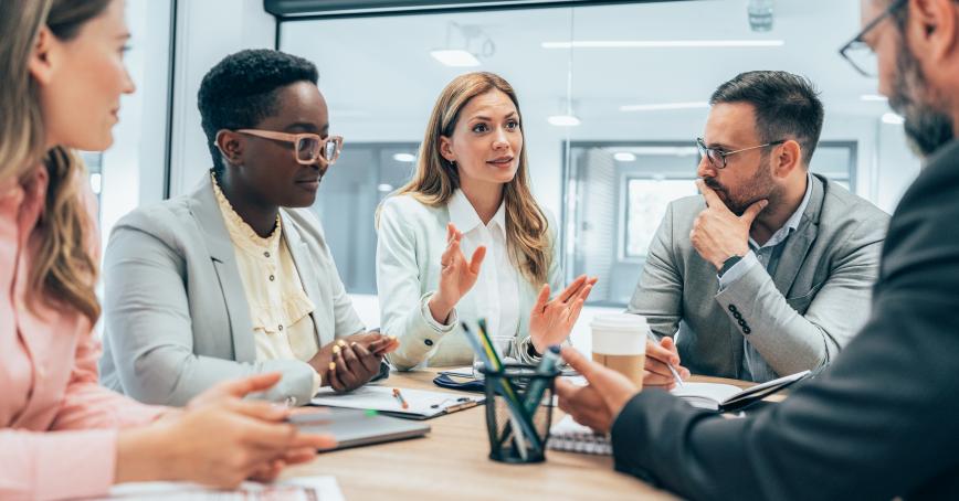 A group of people having a business meeting.