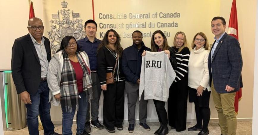 A group of students pose at the Canadian consulate as part of their international residency