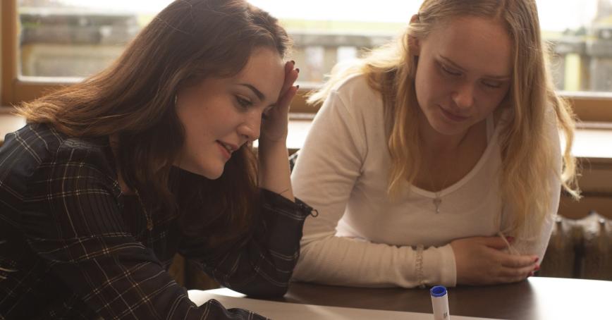 Students taking notes