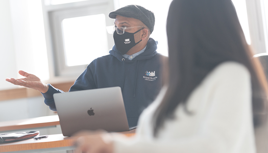 RRU-student-with-mask-and-laptop