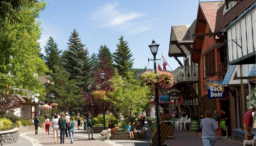 people-walking-down-a-pedestrian-stroll-in-a-town