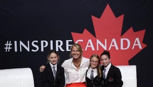 Jennifer Walinga posing with three young girls