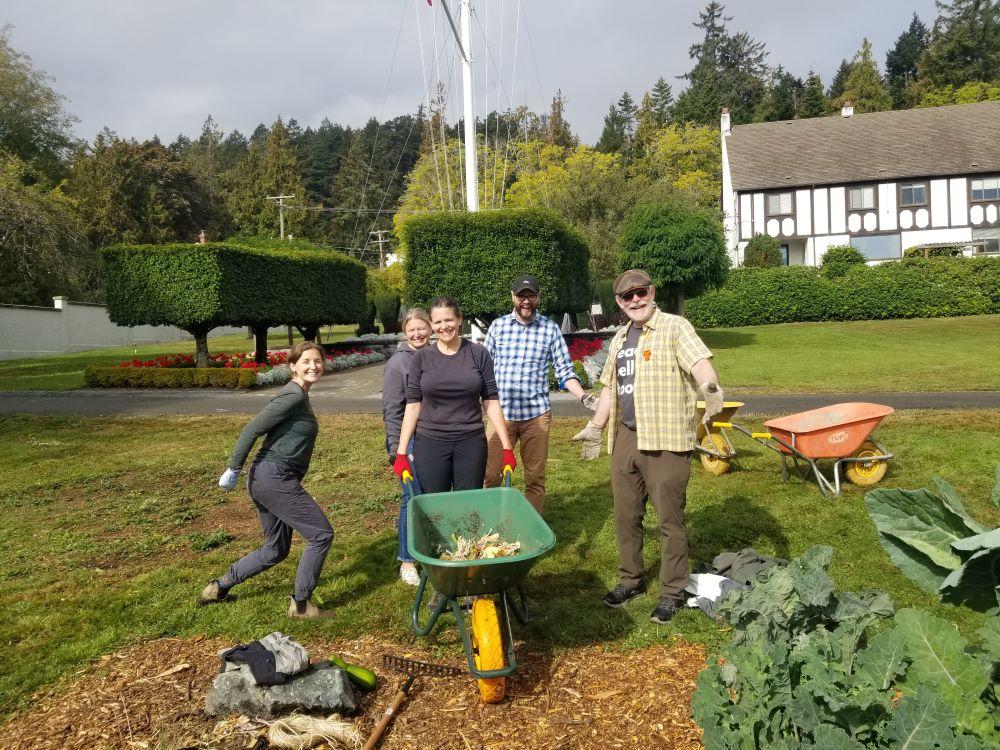 Photo of School of Leadership Studies employees volunteering in the RRU Giving Garden