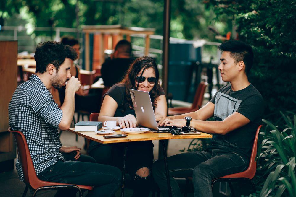 Photo by Helena Lopes on Unsplash - Coffee gathering