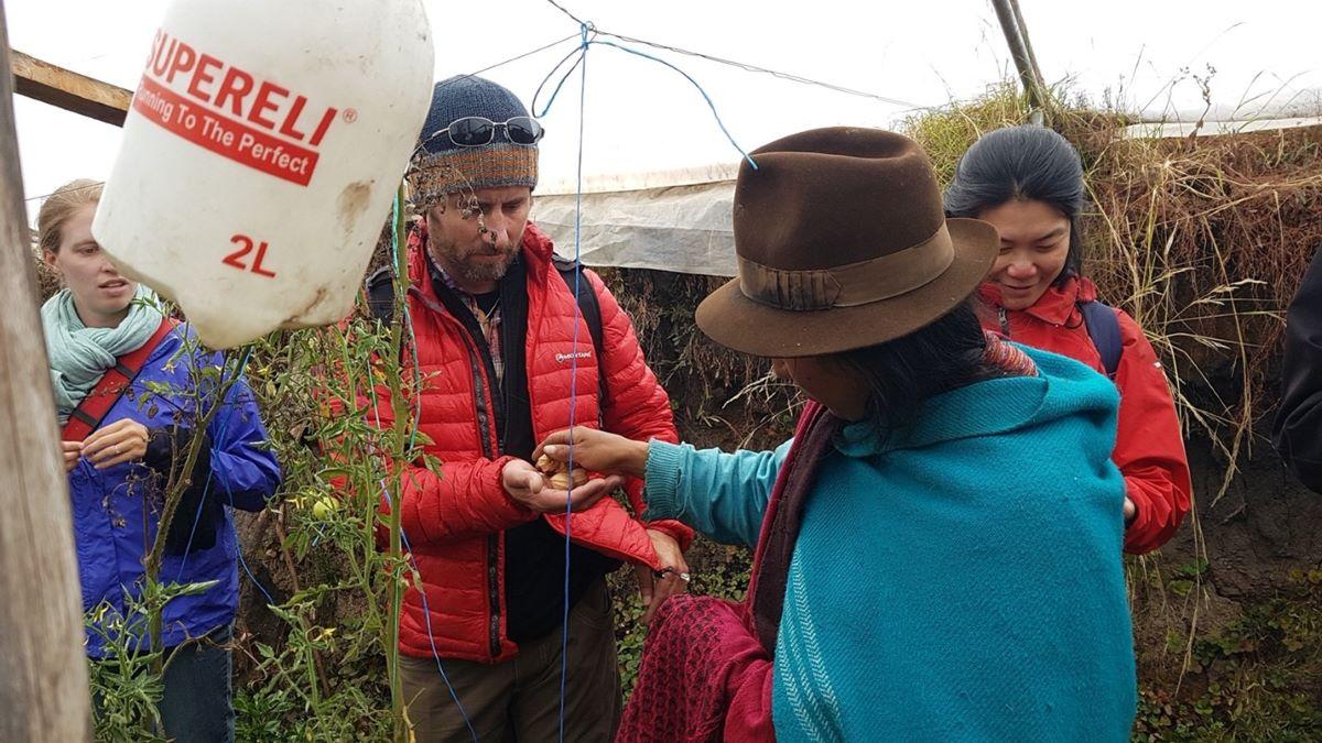 Students on field trip in Ecuador meeting with a community representative