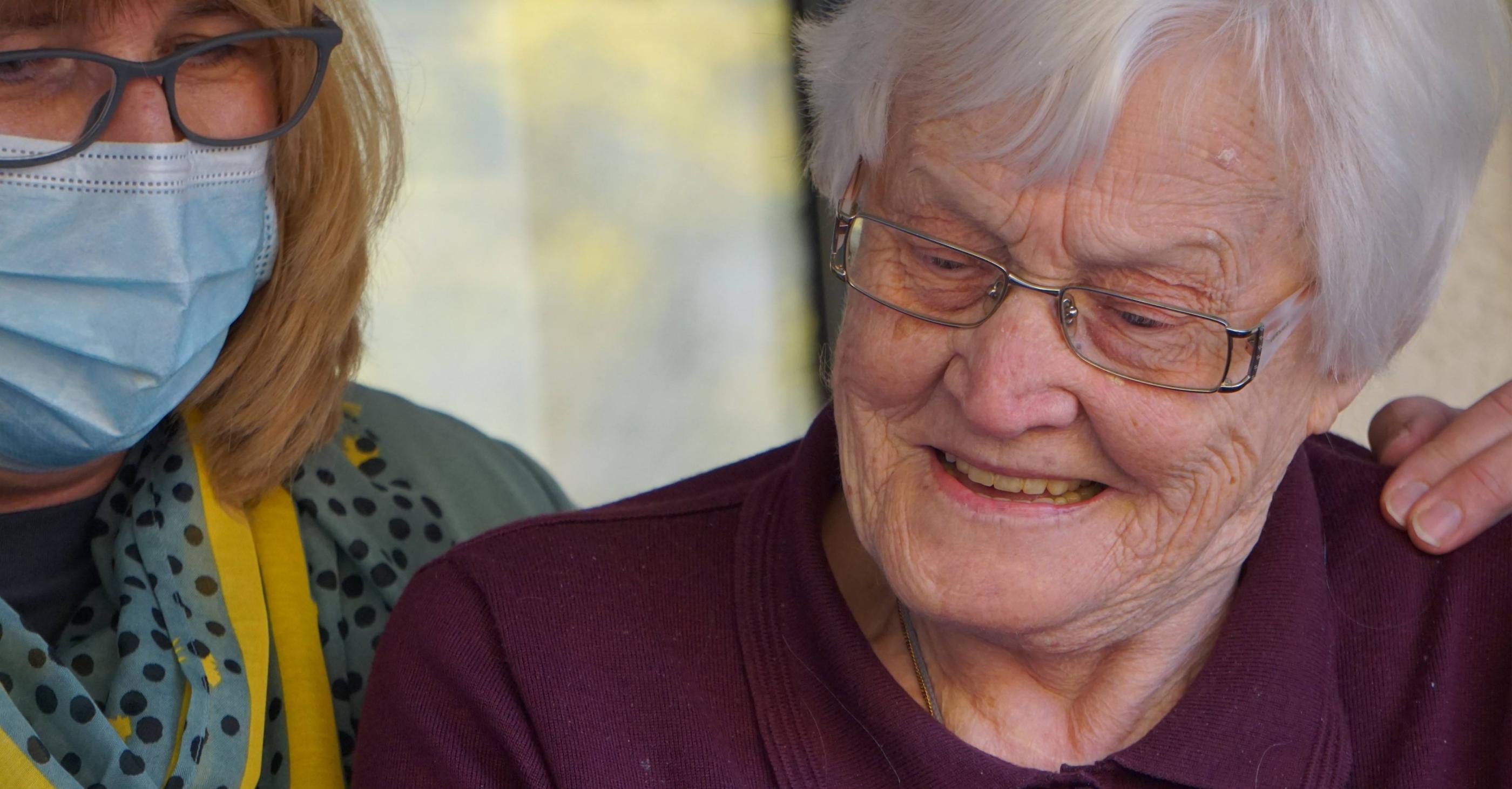 Care giver with elderly person 