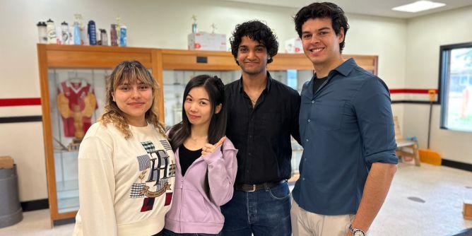 Four students posing for a photo.