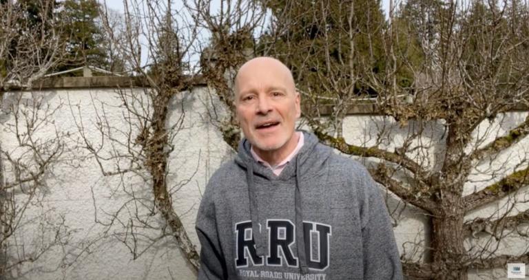 President Steenkamp speaking outdoors by a snow-covered field