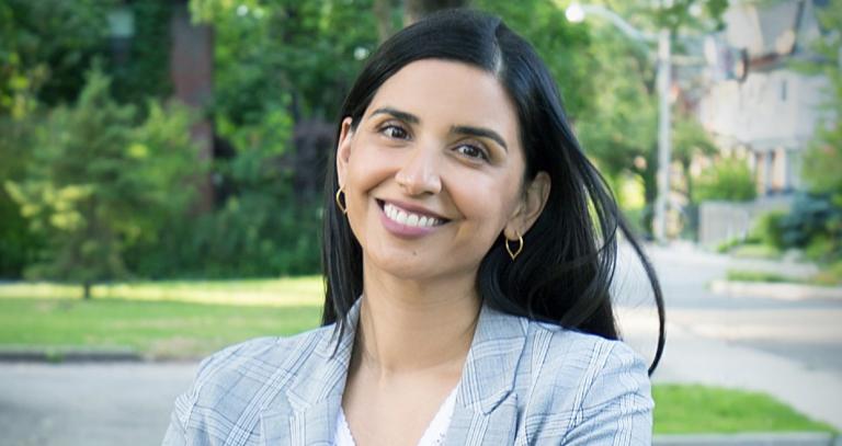 Portrait of Dr. Sonia Kang standing outdoors 