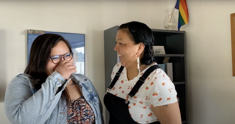 Lynai Quatell & Mercedes Dawson from Hulitan Family & Community Services Society share a big laugh.