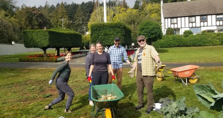 Photo of School of Leadership Studies employees volunteering in the RRU Giving Garden