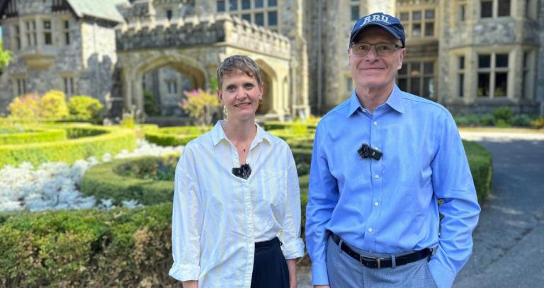 Rebecca Sharma and Philip Steenkamp pose in front of Hatley Castle