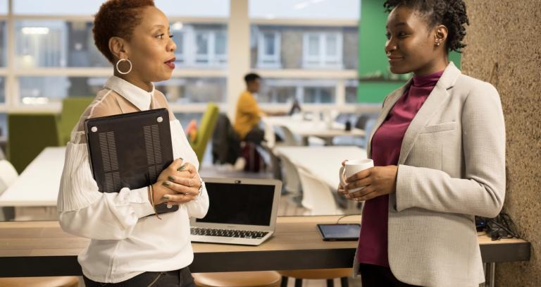 two women discussing