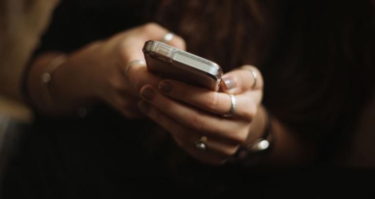 Girl's hands texting