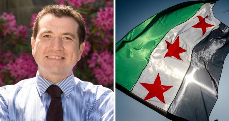 Hassan Wafai pictured alongside an image of the Syrian flag