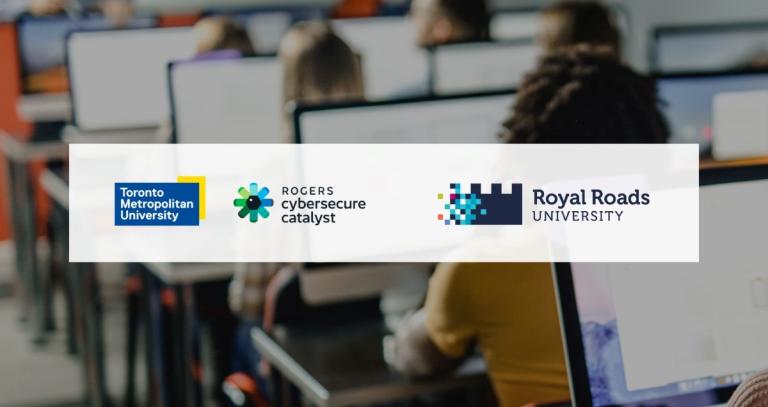The logos of Toronto Metropolitan University, Rogers Cybersecure Catalyst and Royal Roads University against a white background, superimposed over an image of people using computers in a classroom