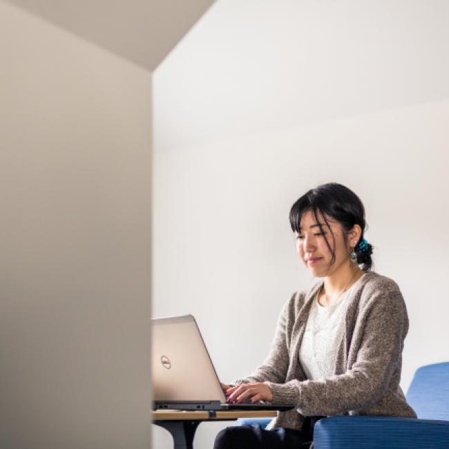 Student working at laptop