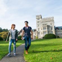 Two-students-walking-on-path-in-front-of-Hatley-Castle