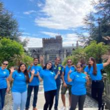 Student volunteers with Hatley Castle in the background.